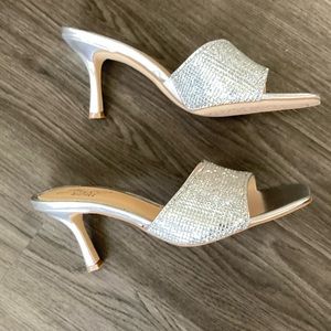 Sparkling sandals with a heel and square toe,  tapered heel make this a fun shoe